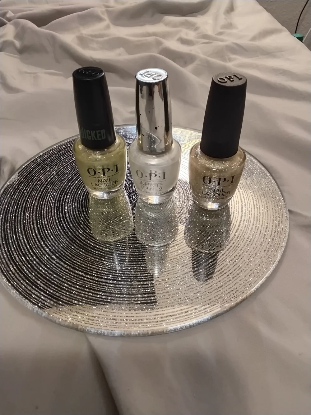 OPI Trio in White, Pale Yellow, Gold Glitter